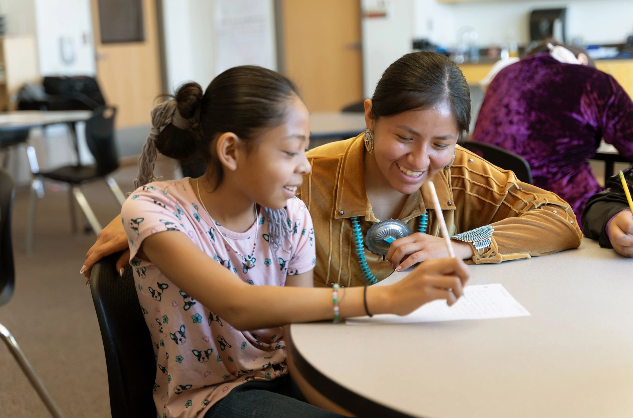 Tutor helping a student one-on-one